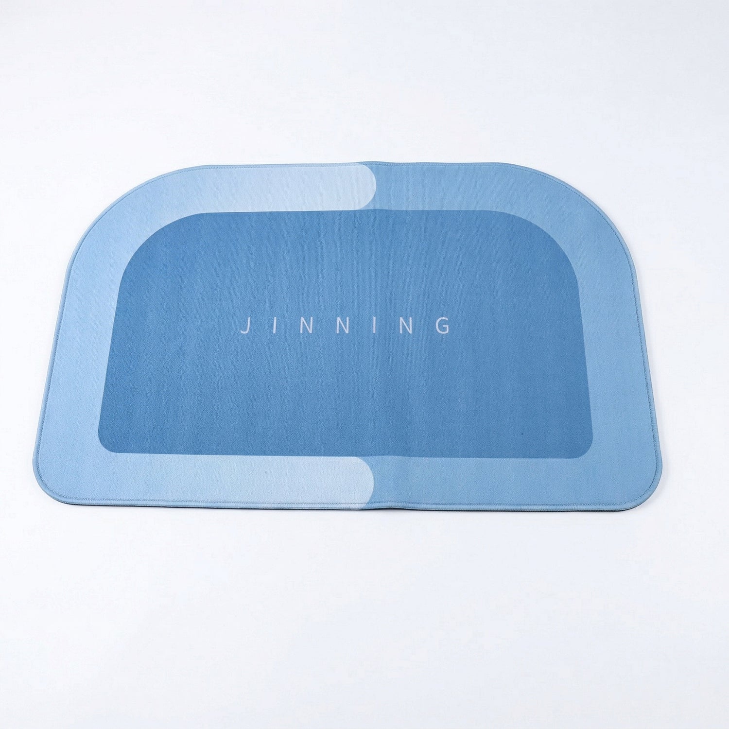 Wukusy super absorbent bathroom floor mat in white, 120x74 cm, soaking water for a dry, slip-resistant surface.