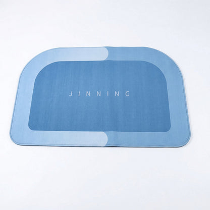 Wukusy super absorbent bathroom floor mat in white, 120x74 cm, soaking water for a dry, slip-resistant surface.