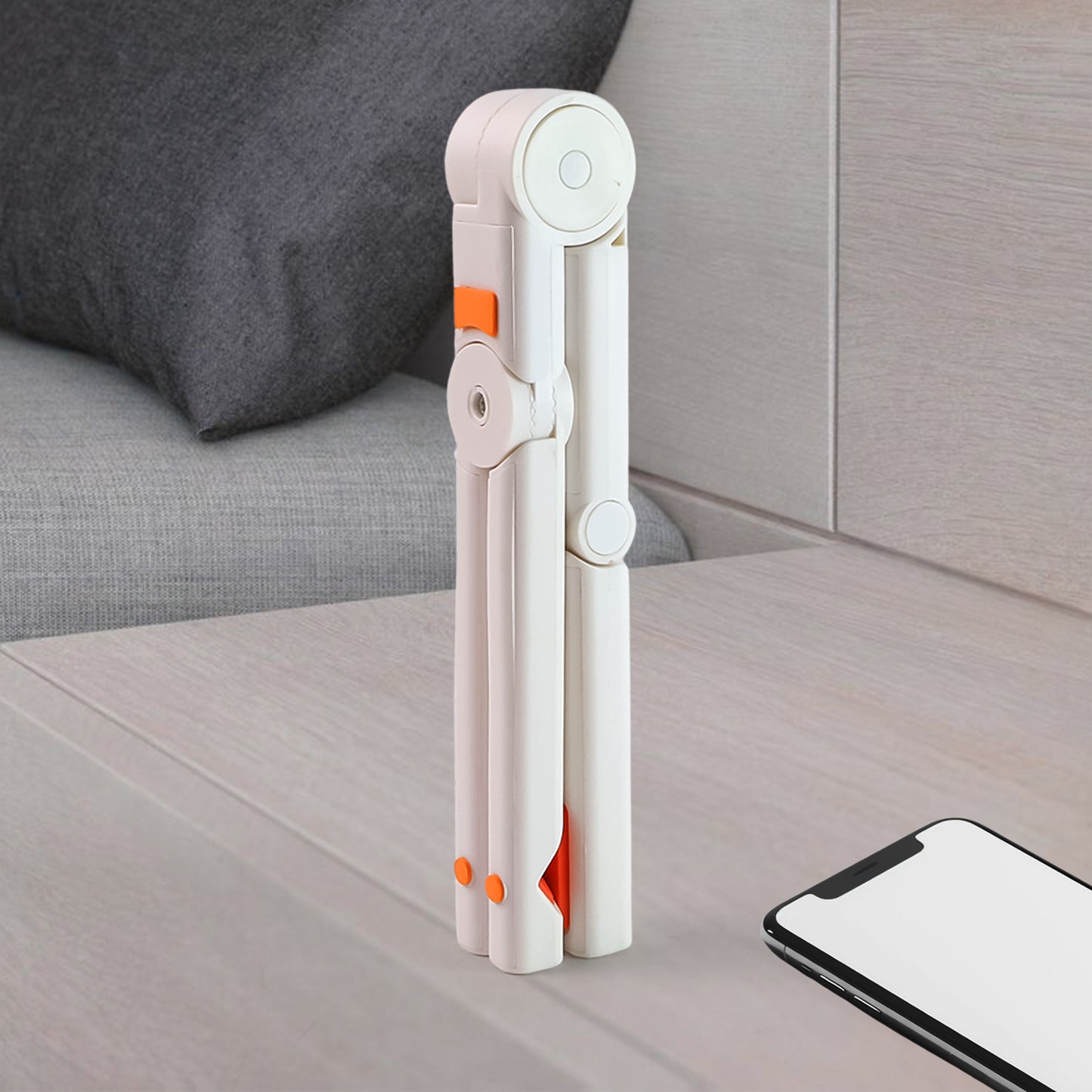 Wukusy portable foldable universal mobile phone stand holder, black plastic design, adjustable for viewing on desks or surfaces.