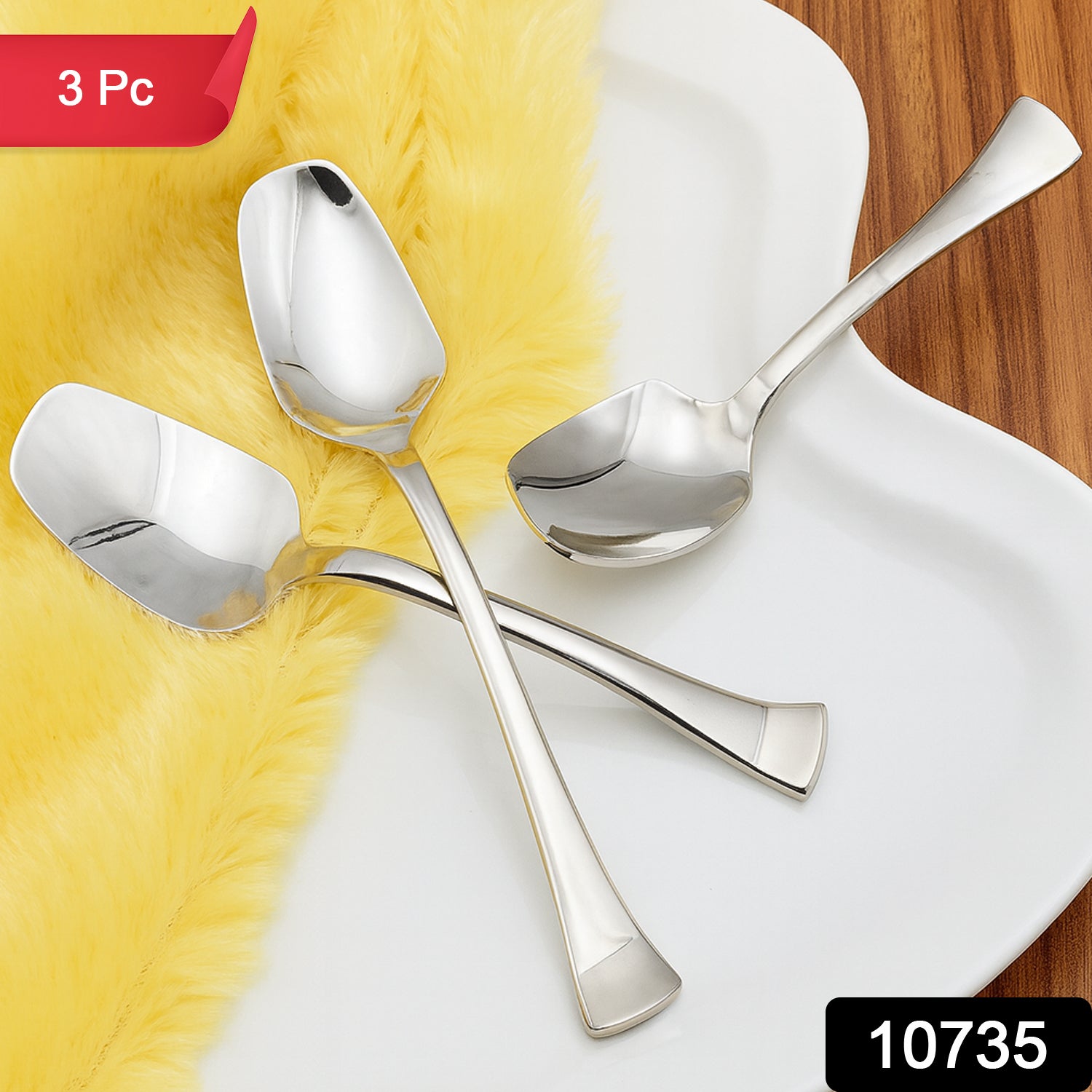 Wukusy stainless steel ice-cream spoons, 3-piece set, with ergonomic handles for serving ice cream in a home kitchen setting.