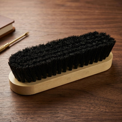 Wukusy Maxwax Shoe Cleaning Brush with wooden handle and natural bristles for effective shoe care and polishing.