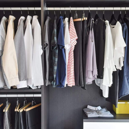 Wukusy premium cloth hanger with metal hook for shirts, coats, and tops, displayed hanging in a wardrobe.