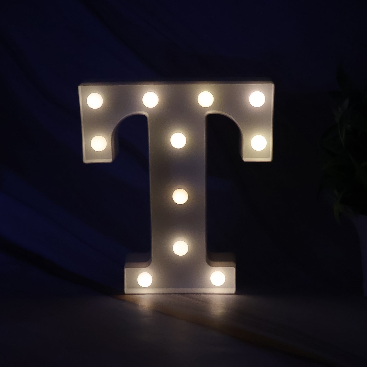 Decorative LED marquee alphabet letter T light by Wukusy, perfect for home decor, illuminated letter with a warm glow.