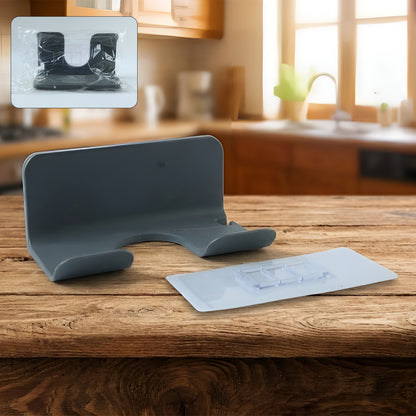 Wall-mounted Wukusy hair dryer holder with a sleek design, showcasing its secure wall attachment and compact storage.