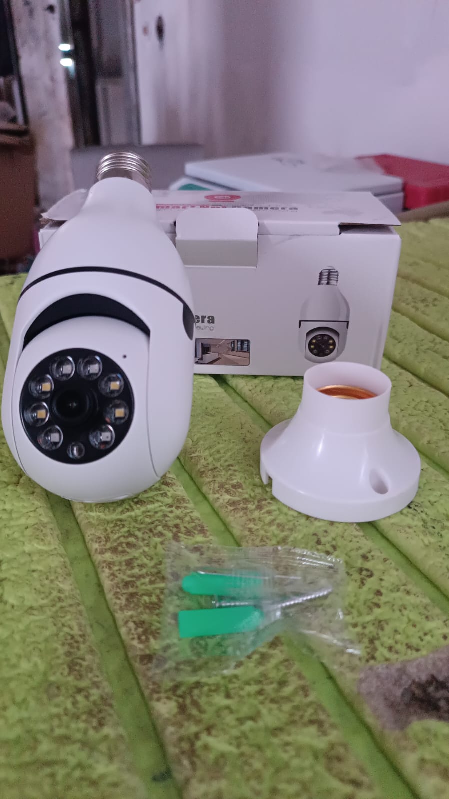 Wukusy V380 Pro fisheye 360° wireless WiFi IP CCTV security camera for office surveillance, shown mounted on wall.