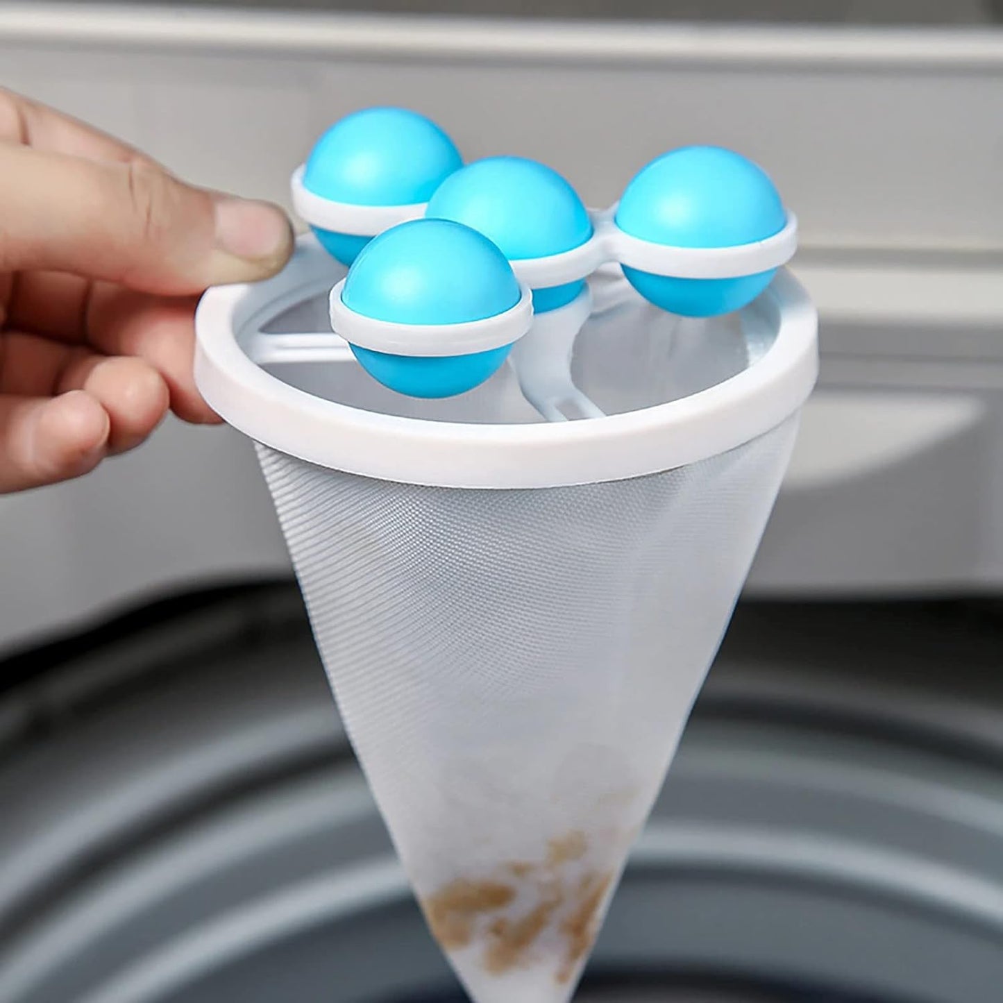 Wukusy laundry ball pet fur lint catcher in mesh bag, reusable washing machine lint remover for pet hair and lint removal.