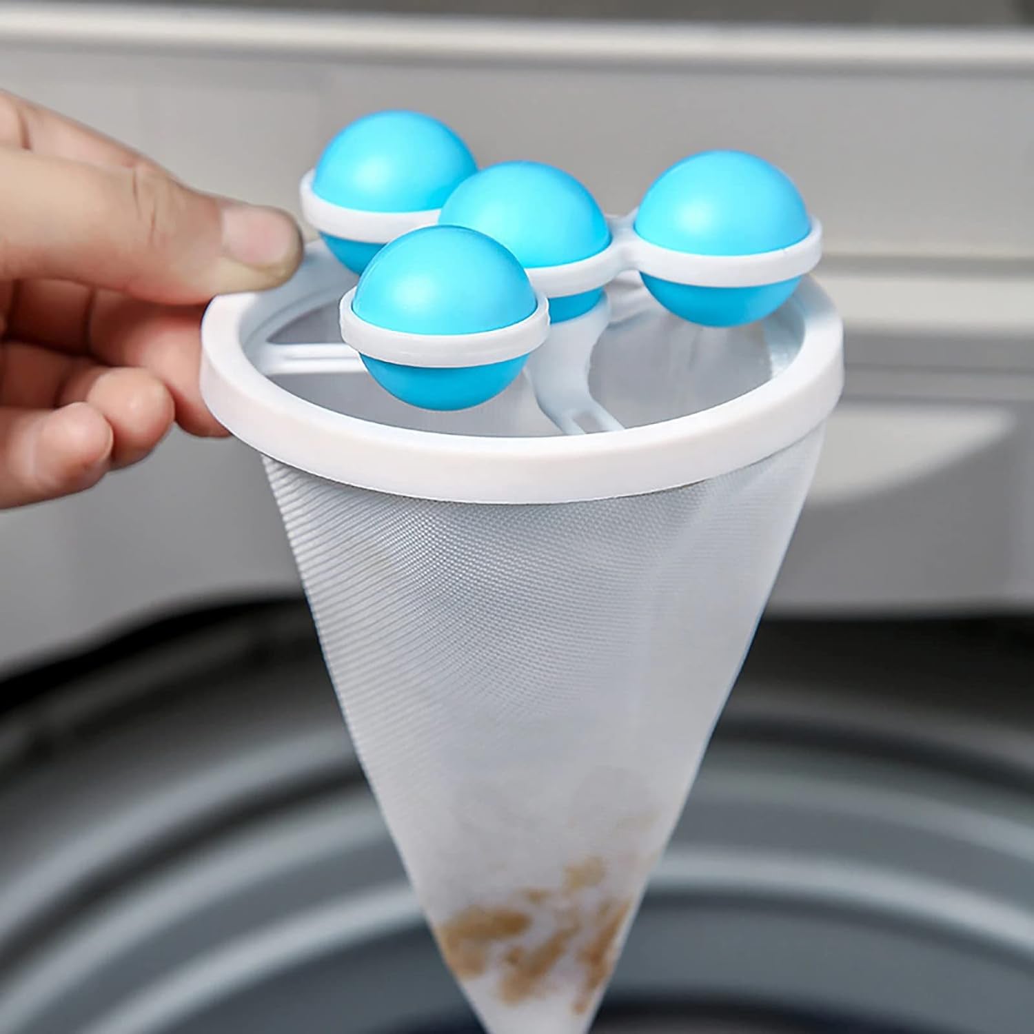 Wukusy laundry ball pet fur lint catcher in mesh bag, reusable washing machine lint remover for pet hair and lint removal.