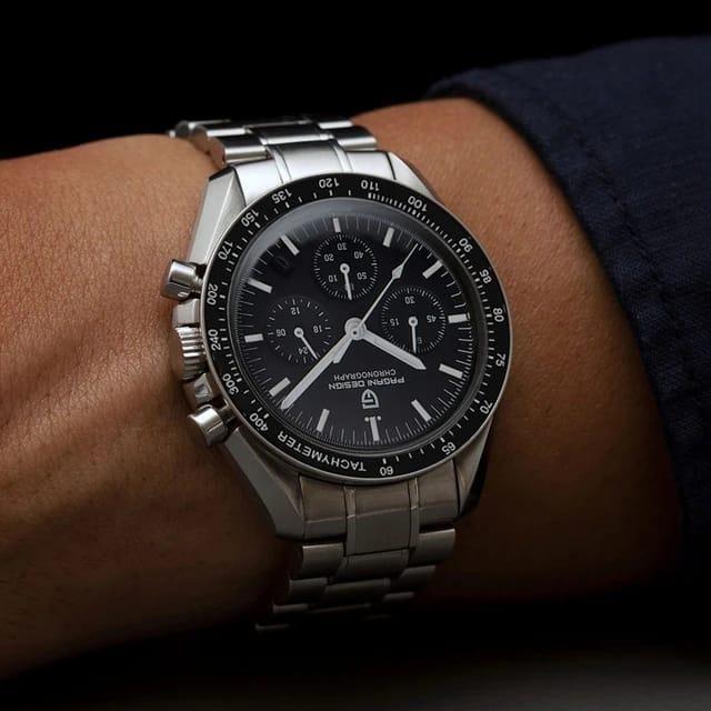 Men's silver stainless steel strap watch from Drpshippr Men's Collection, featuring a sleek and modern design.
