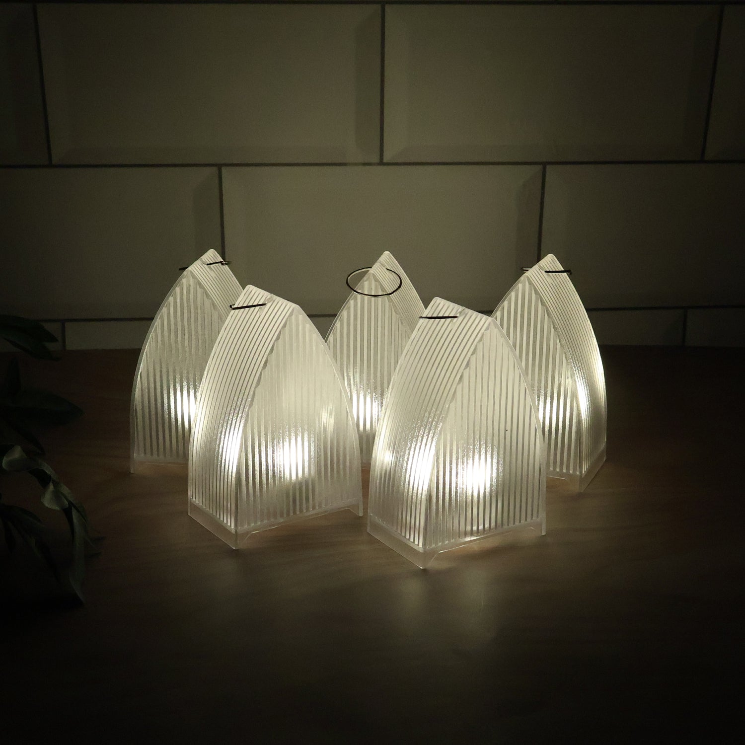 Set of 5 Wukusy LED flameless decorative lantern lights for home decor, featuring warm glow and realistic candle-like appearance.