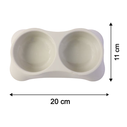 Wukusy dual pet food and water feeding tray with two bowls for dogs and cats, made of durable plastic.