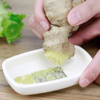 Wukusy multipurpose garlic and ginger grinding plate, round ceramic or stone tool for crushing and grinding fresh herbs and spices.