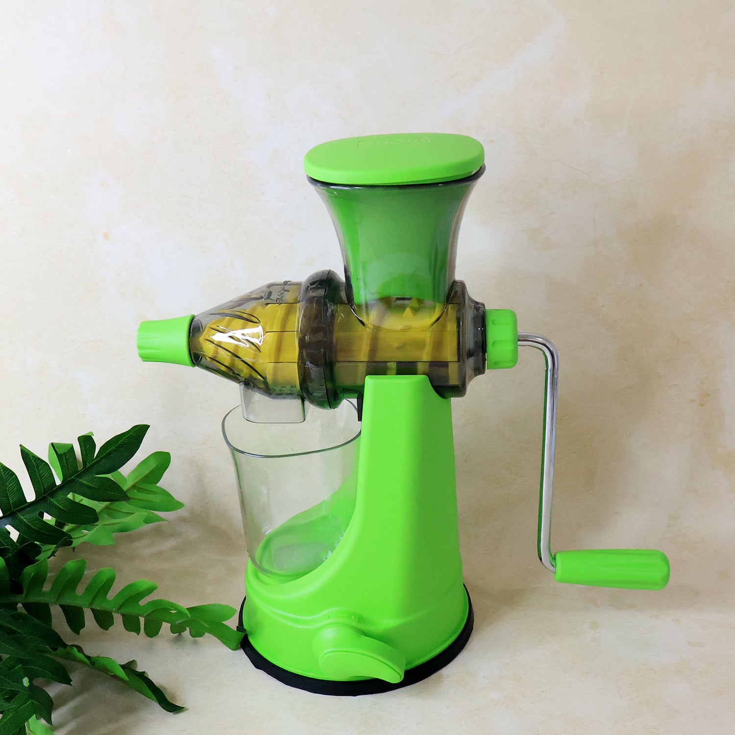 Wukusy Supermom manual multi-functional fruit and vegetable juicer on a kitchen countertop, ready for fresh juice extraction.