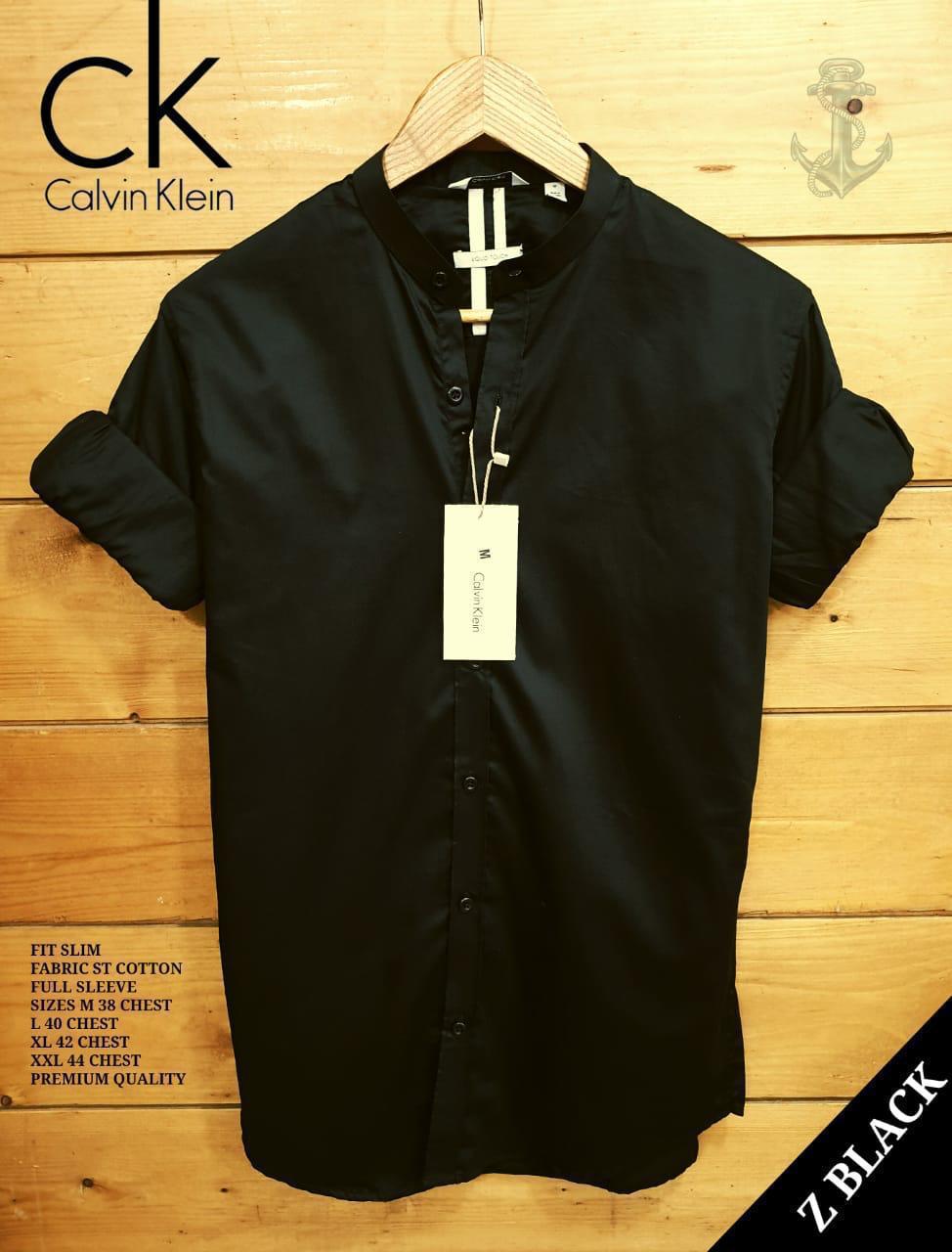 Black men's collar shirt from Seasons, stylish button-up shirt with a classic collar, suitable for casual or formal wear.
