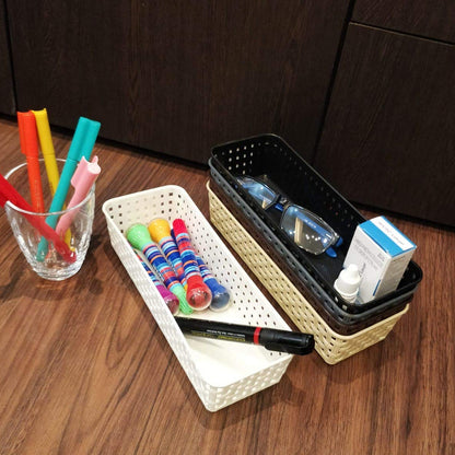 Set of six Wukusy plastic multipurpose desk organizer trays with colorful dividers, suitable for office, kitchen, bathroom, or bedroom storage.