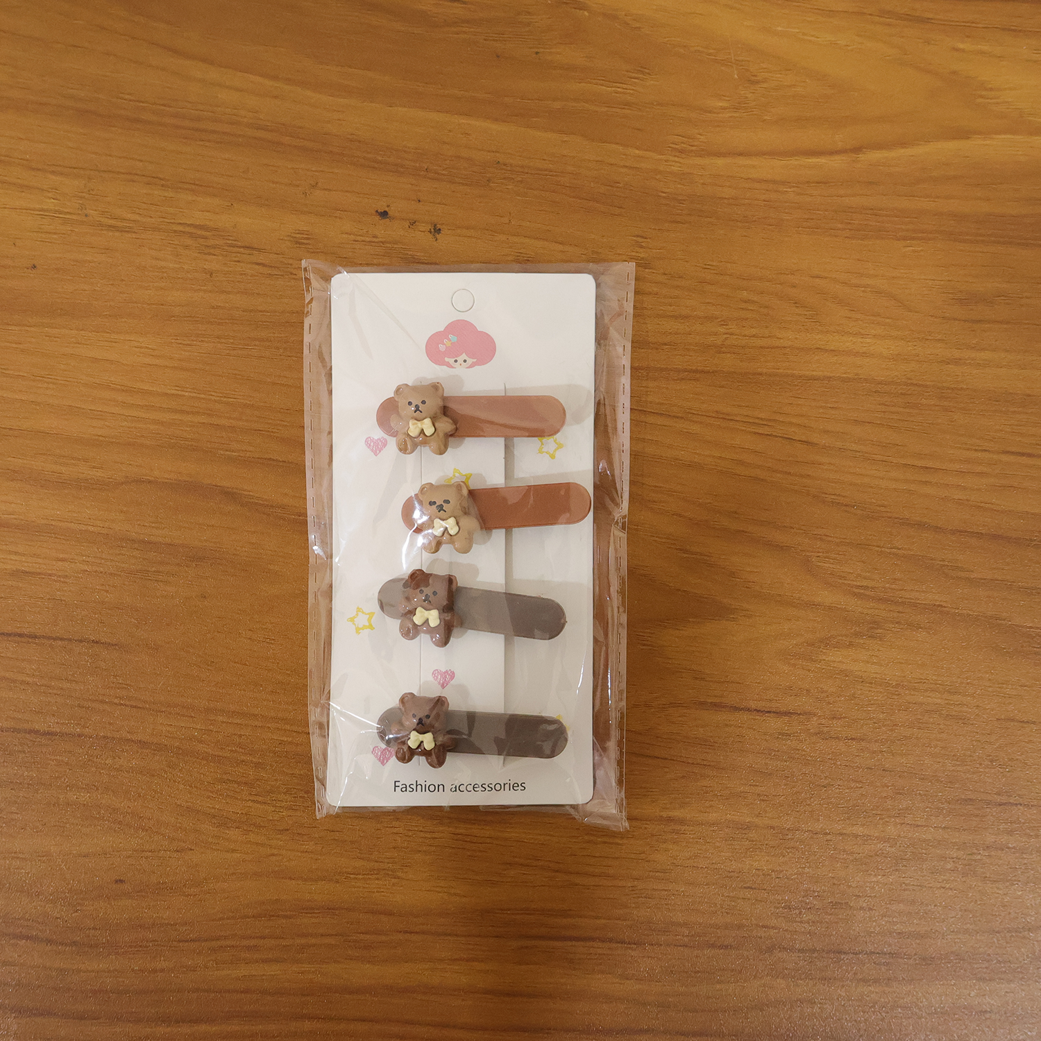 Set of four cute teddy bear decorative hair clips by Wukusy, featuring adorable bear designs for hair accessories.