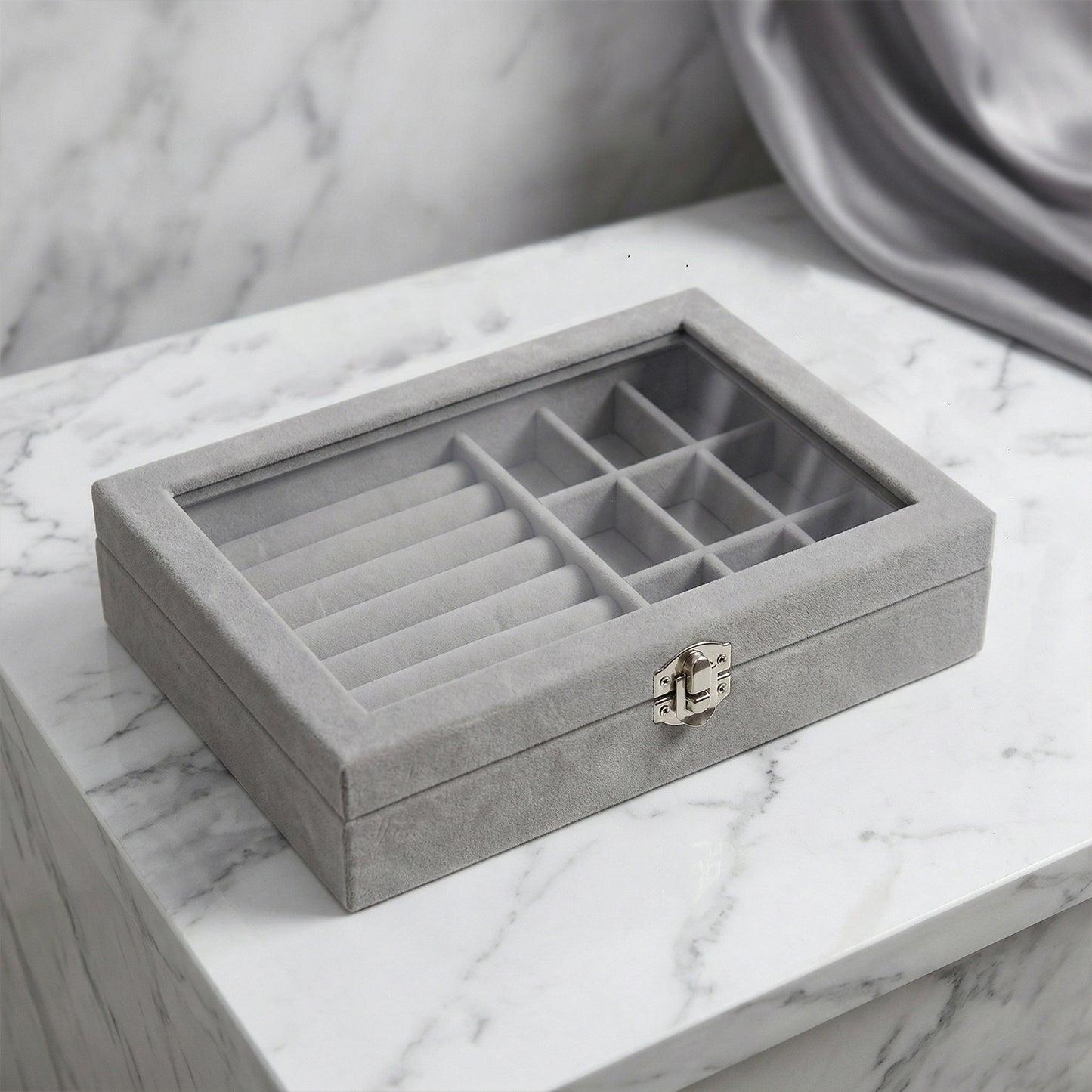 Wukusy premium velvet jewelry organizer box with transparent lid, showcasing compartments for necklaces, rings, and earrings.