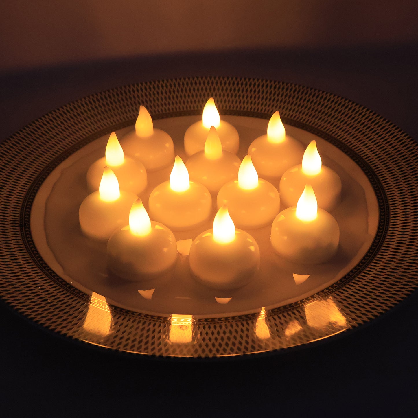 Set of 12 Wukusy LED floating smokeless candles for home decor, featuring warm glow and modern floating design.