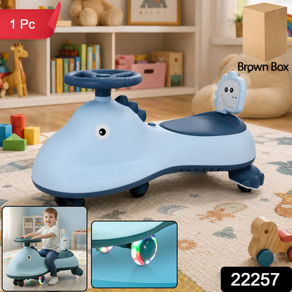Blue shark design kids swing car ride-on toy with music by Wukusy, featuring a magic twist for active play.