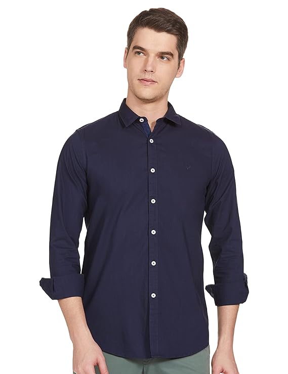 Blue men's slim fit shirt by Seasons, displayed flat with collar and buttons, showcasing elegant design and tailored fit.