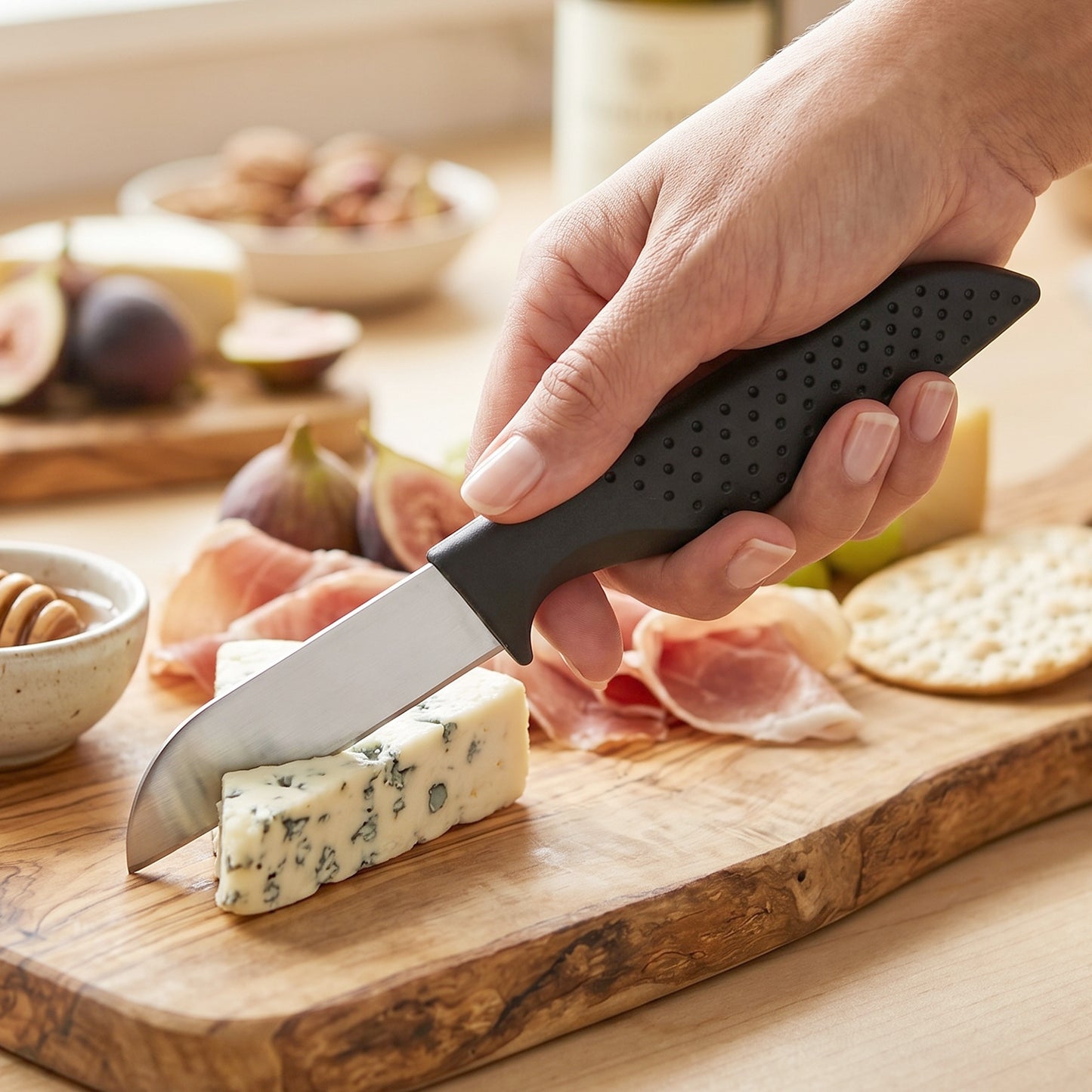 Wukusy 12-piece kitchen knife set with stainless steel chef knives and ergonomic handles displayed on a wooden cutting board.
