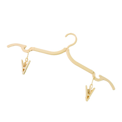 Wukusy multipurpose foldable cloth hanger with dual clips, ideal for home organization and hanging clothes or accessories.