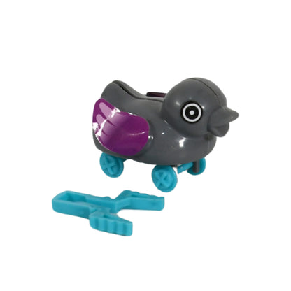Small Wukusy push-back duck toy with spring tail, ejectable feature, suitable for DIY toy projects, colorful plastic duck toy.
