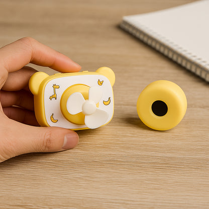 Cute bear-shaped mini rechargeable office fan by Wukusy, showing the fan with bear face design and compact size in use