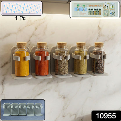Wall-mounted Wukusy adjustable spice rack organizer with multiple shelves for kitchen storage and easy access to spices.