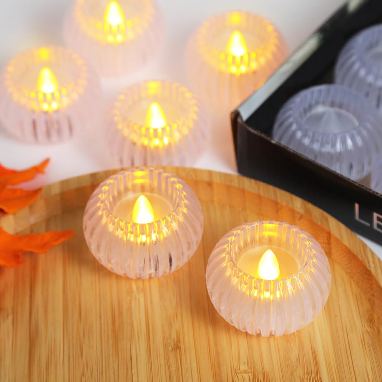 Set of 12 Wukusy LED crystal-effect flameless smokeless decorative candles for elegant home decor.