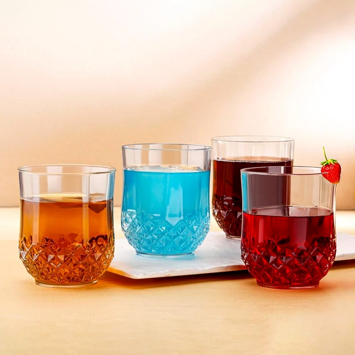 Six clear drinking glasses with diamond pattern design from Wukusy, arranged on a table for everyday use.