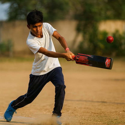 Wukusy lightweight durable plastic cricket bat measuring 87x11 cm, shown in a natural position on a plain background.