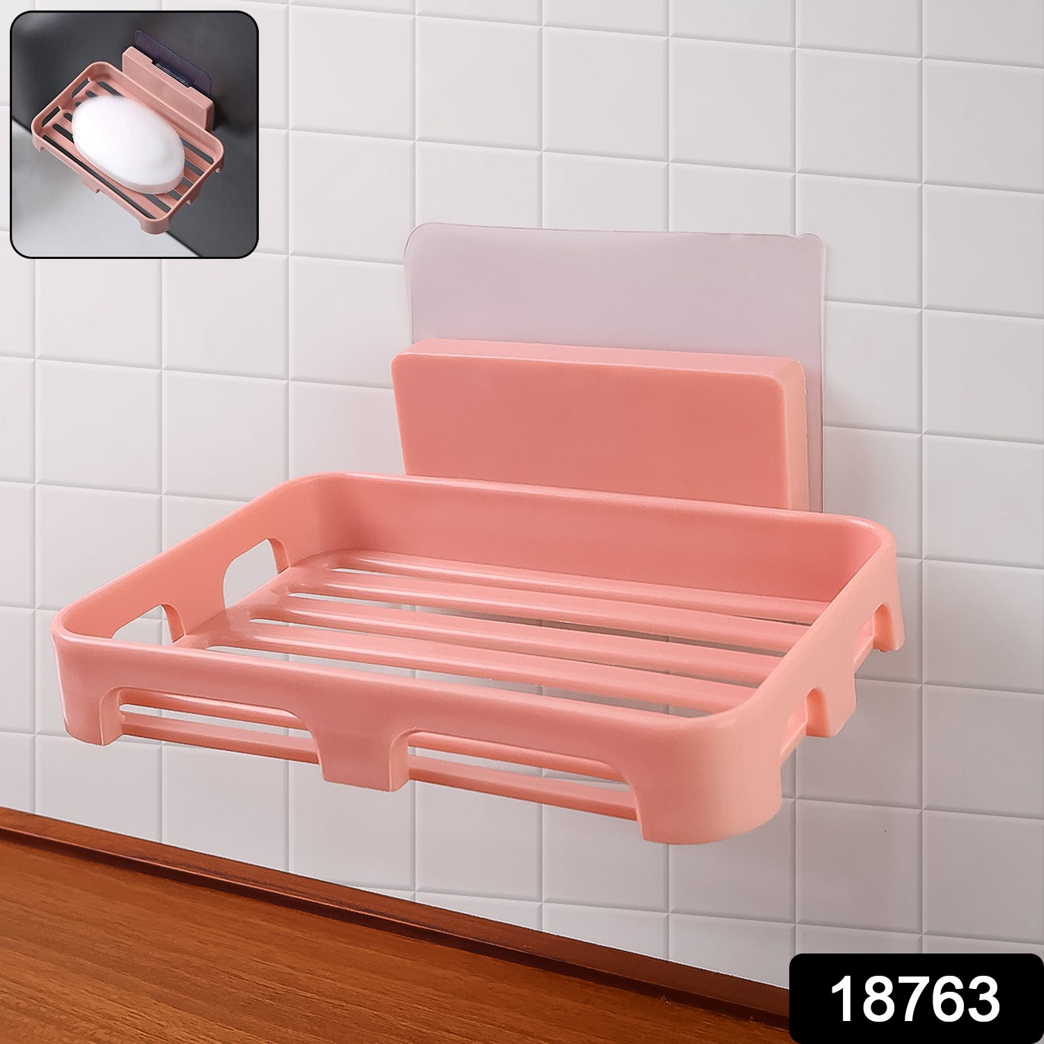 Wukusy self-adhesive rectangular soap dish holder attached to a bathroom wall, designed for easy soap storage and drainage.