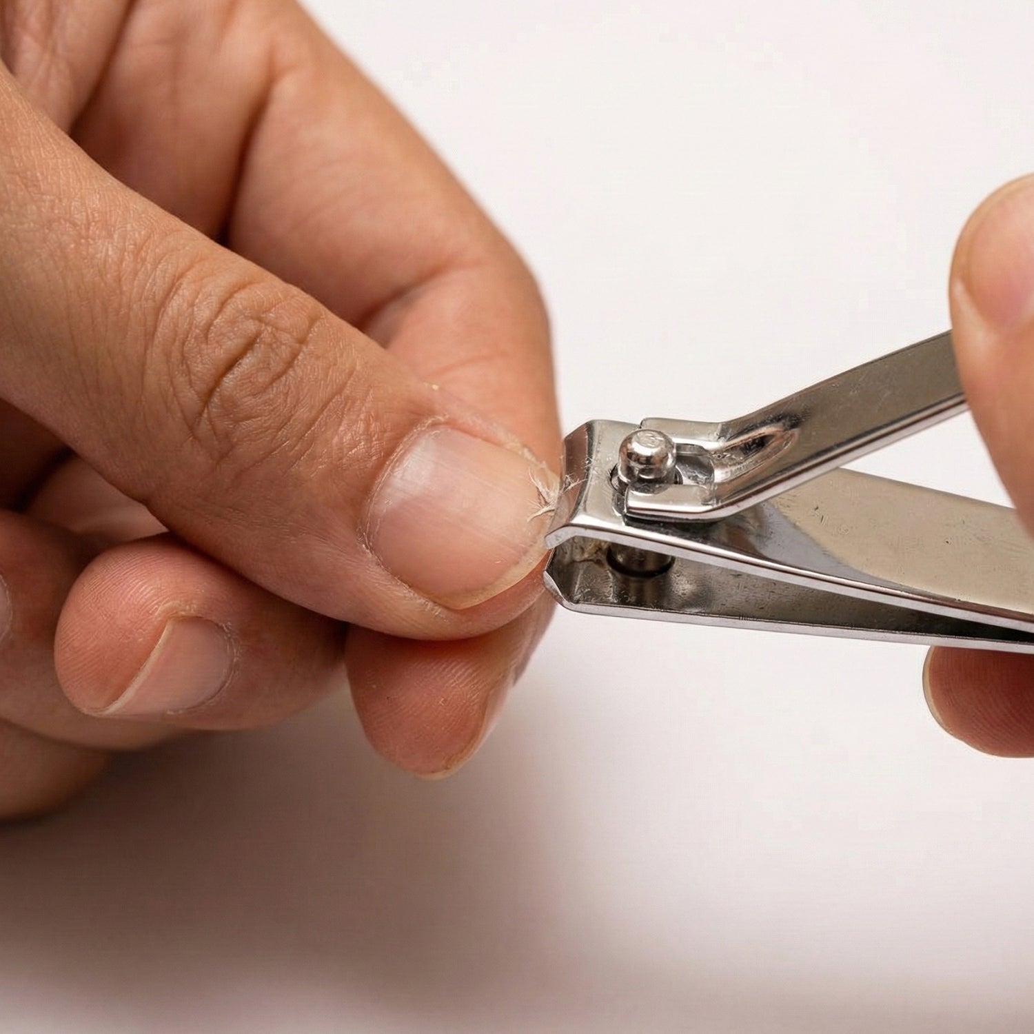 Wukusy premium heavy-duty stainless steel nail cutter with curved blade for precise trimming of fingernails and toenails.