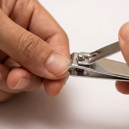 Wukusy premium heavy-duty stainless steel nail cutter with curved blade for precise trimming of fingernails and toenails.