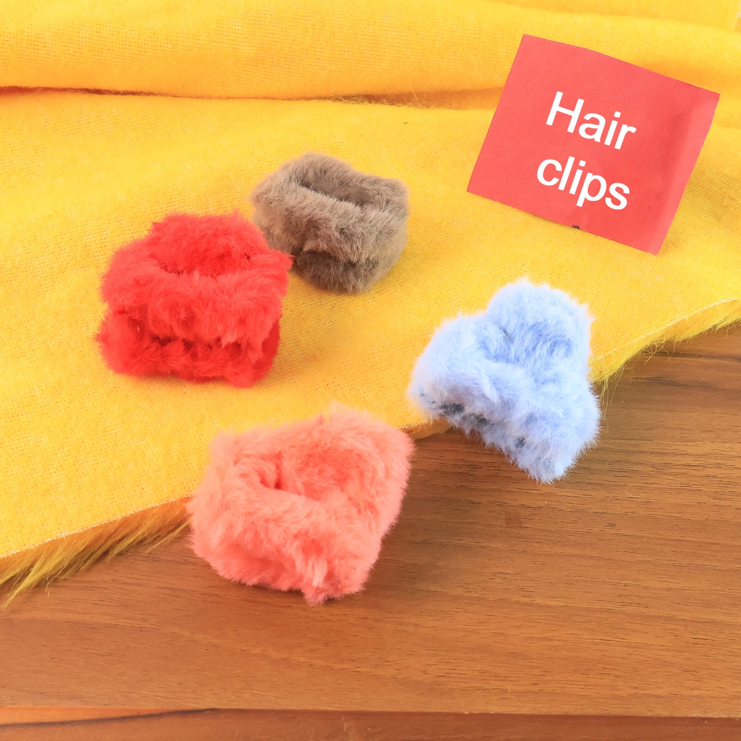 Set of 12 Wukusy small plastic fluffy hair claw clips, perfect for securing hair with a colorful, textured hair accessory.