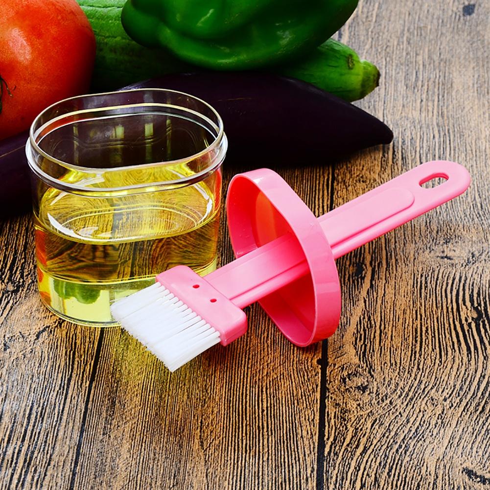 Wukusy 2429 multi-purpose silicone spatula with holder, durable kitchen tool for mixing and scraping in cooking and baking.