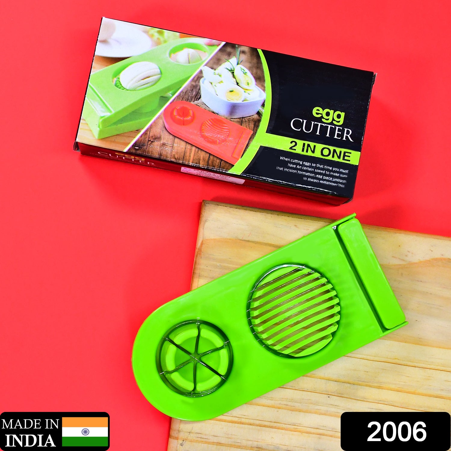 Wukusy 2006 2-in-1 double cut boiled egg cutter with stainless steel wire for easy slicing of boiled eggs in the kitchen.