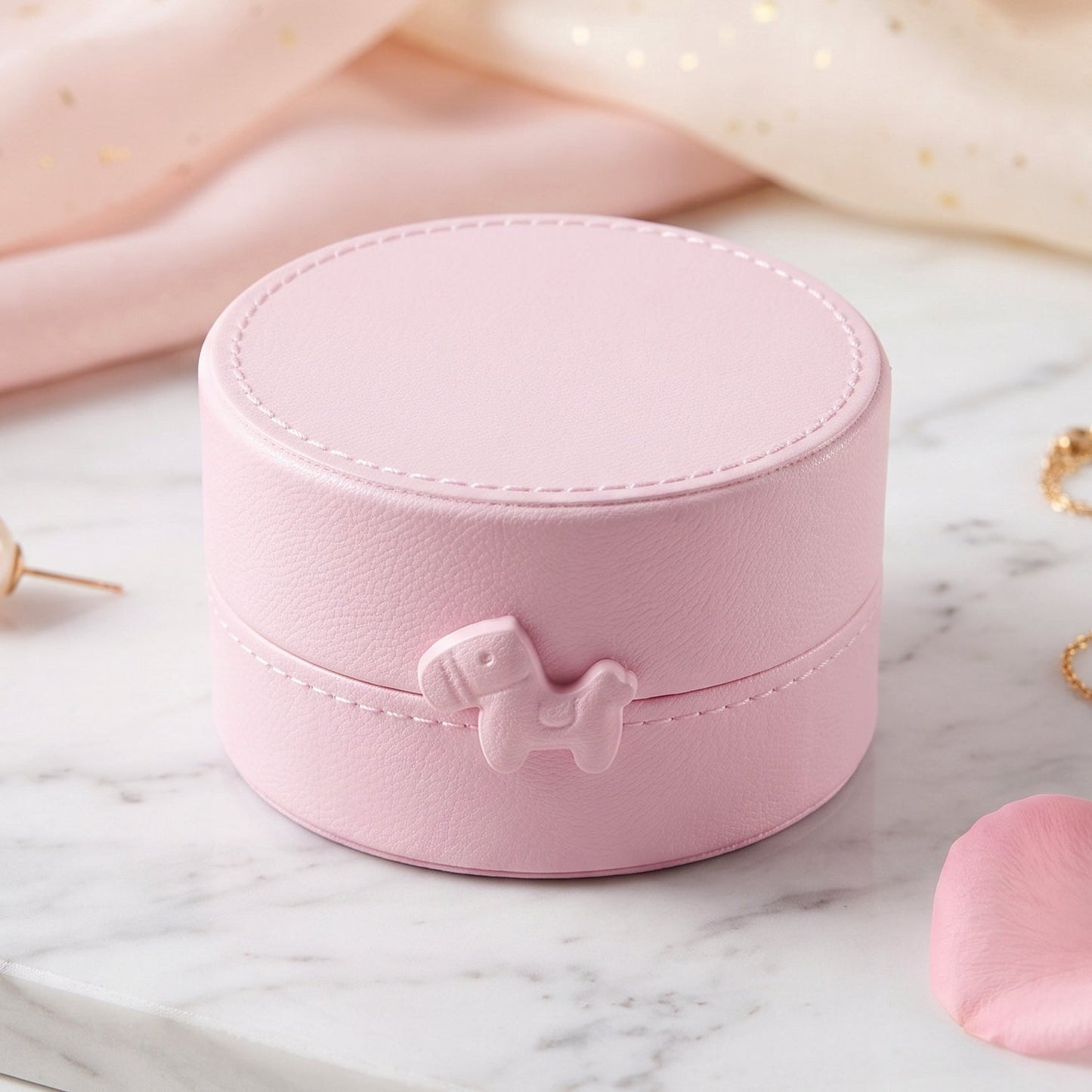 Small round Wukusy jewelry storage box with snap closure, portable organizer case for jewelry and accessories.