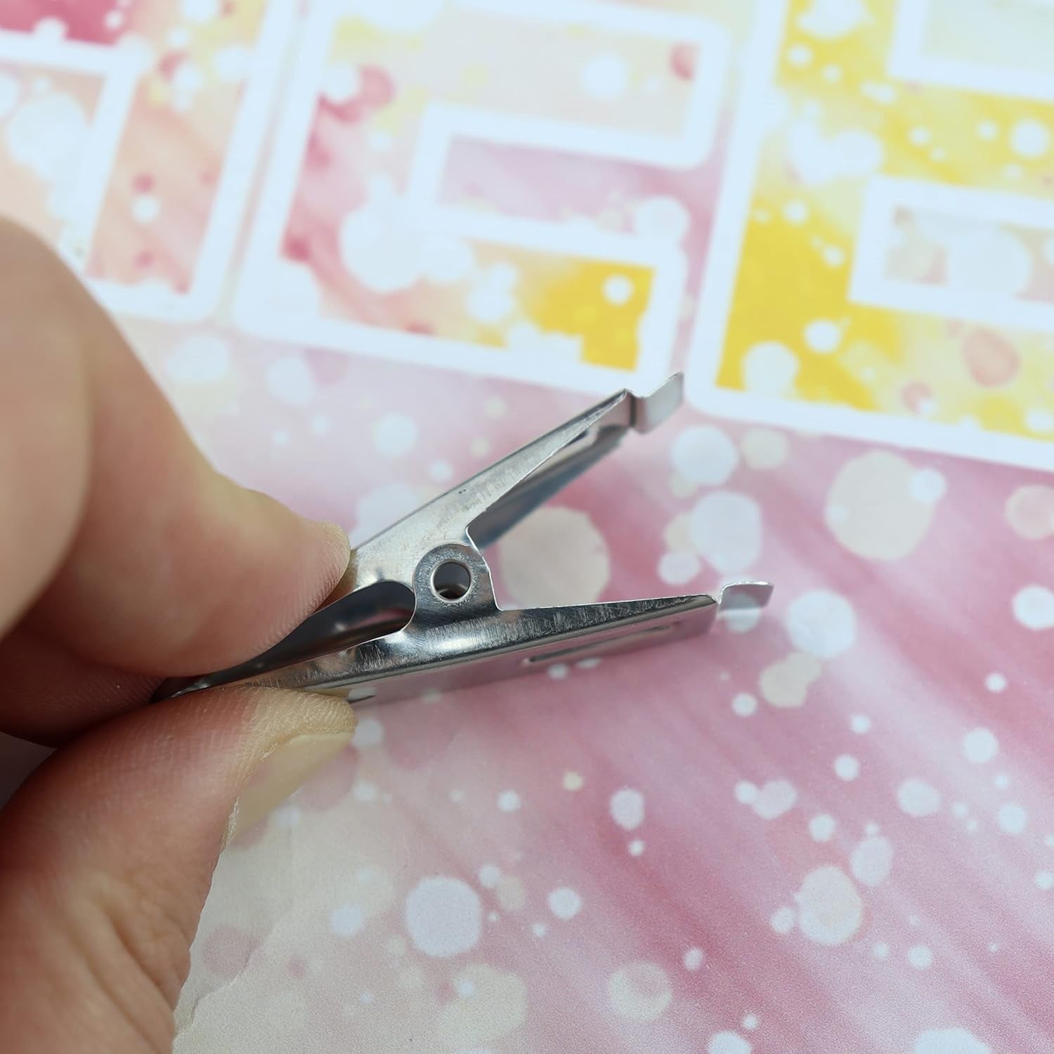 Set of 20 stainless steel cloth drying pins or clips from Wukusy, ideal for hanging clothes to dry.