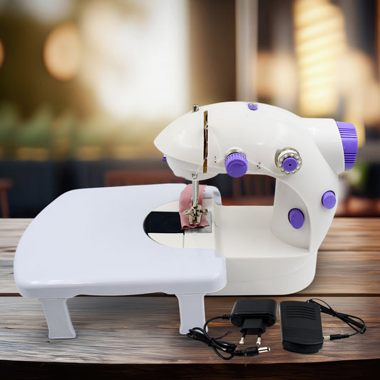 Wukusy home tailoring sewing machine with extension table, foot pedal, and portable electric mini stitching machine in a workspace.