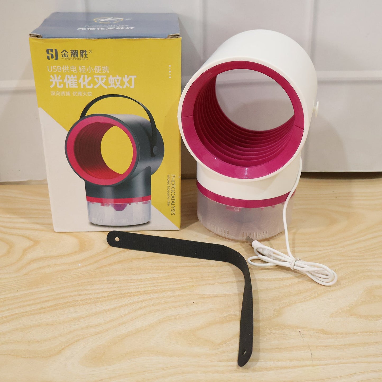 Wukusy portable USB mosquito killer lamp with handle, featuring a suction trap to attract and trap flying insects indoors.