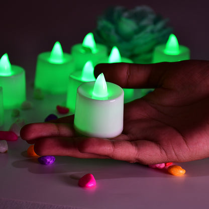 Set of 24 green flameless LED tealights by Wukusy, smokeless plastic candles for home decoration, safe and realistic glowing lights.