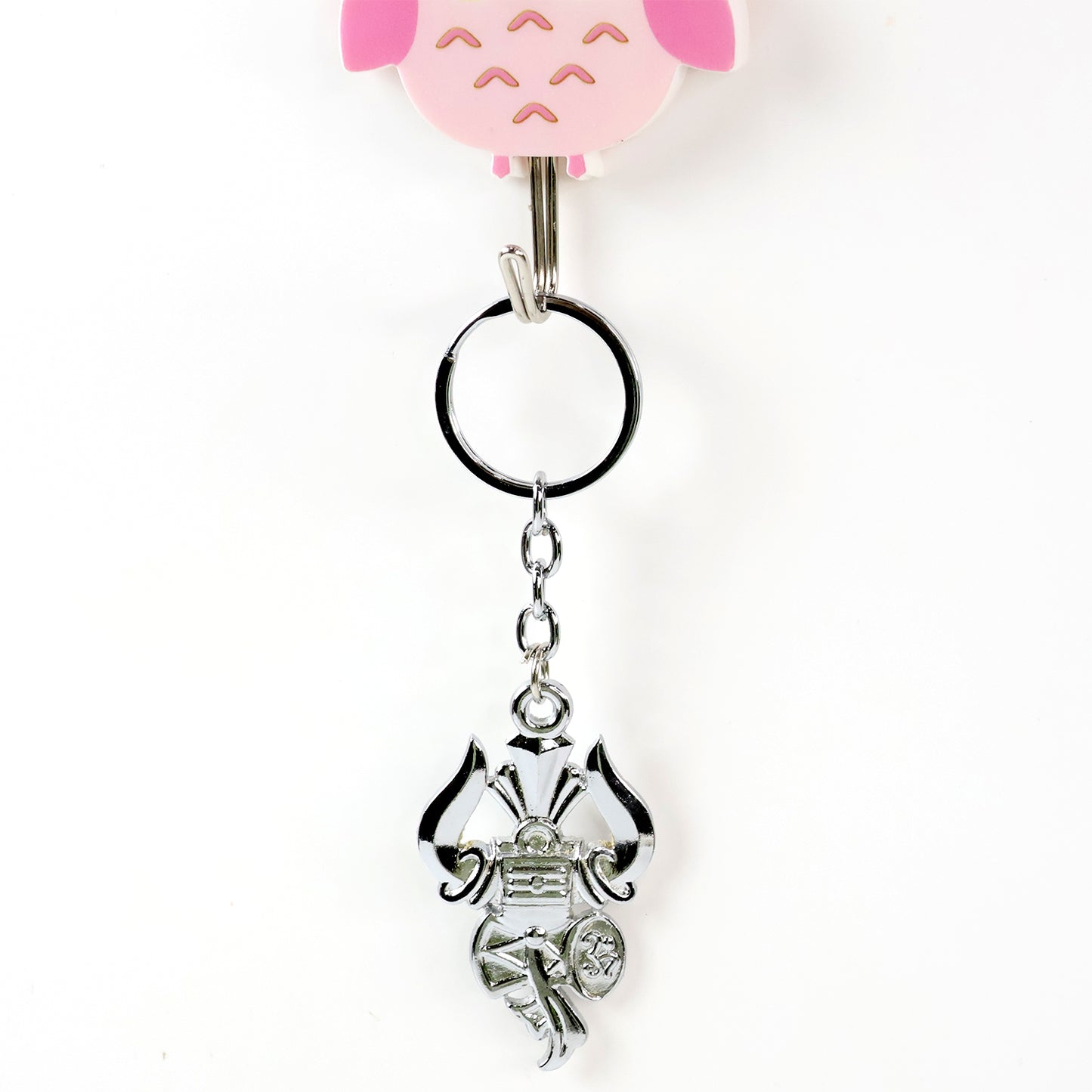 Silver keychain featuring Trishul, Damru, and Shiv symbol from Wukusy, detailed design on a small metal accessory.