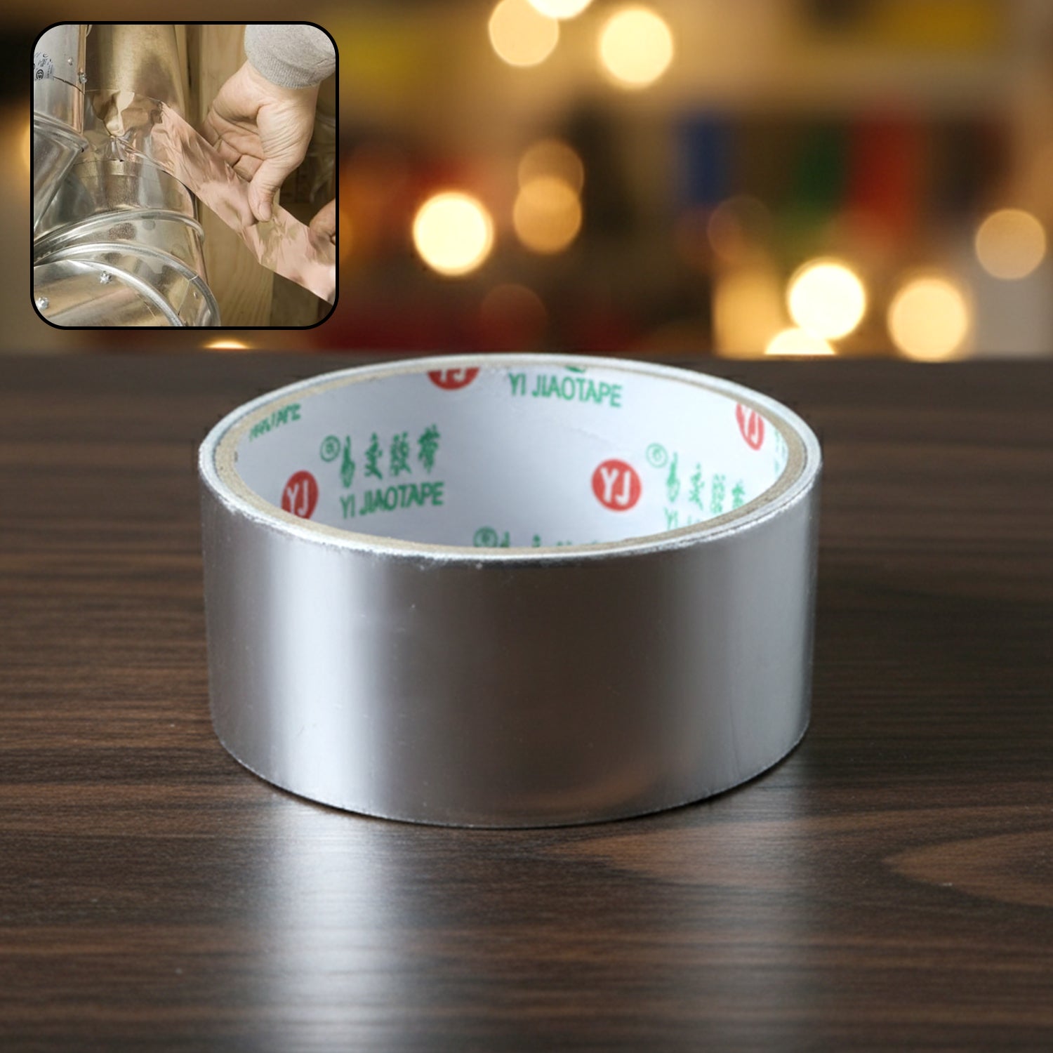 Heavy-duty aluminium foil adhesive tape by Wukusy, 8540 mm length, shown in close-up with foil surface and strong adhesive backing.