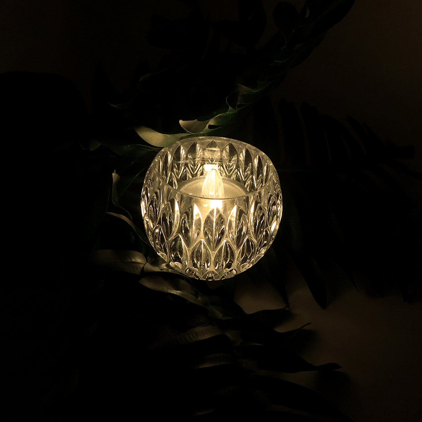 Set of 12 Wukusy crystal-style LED decorative lamps shaped like candles for home decor, with a glowing, elegant appearance.