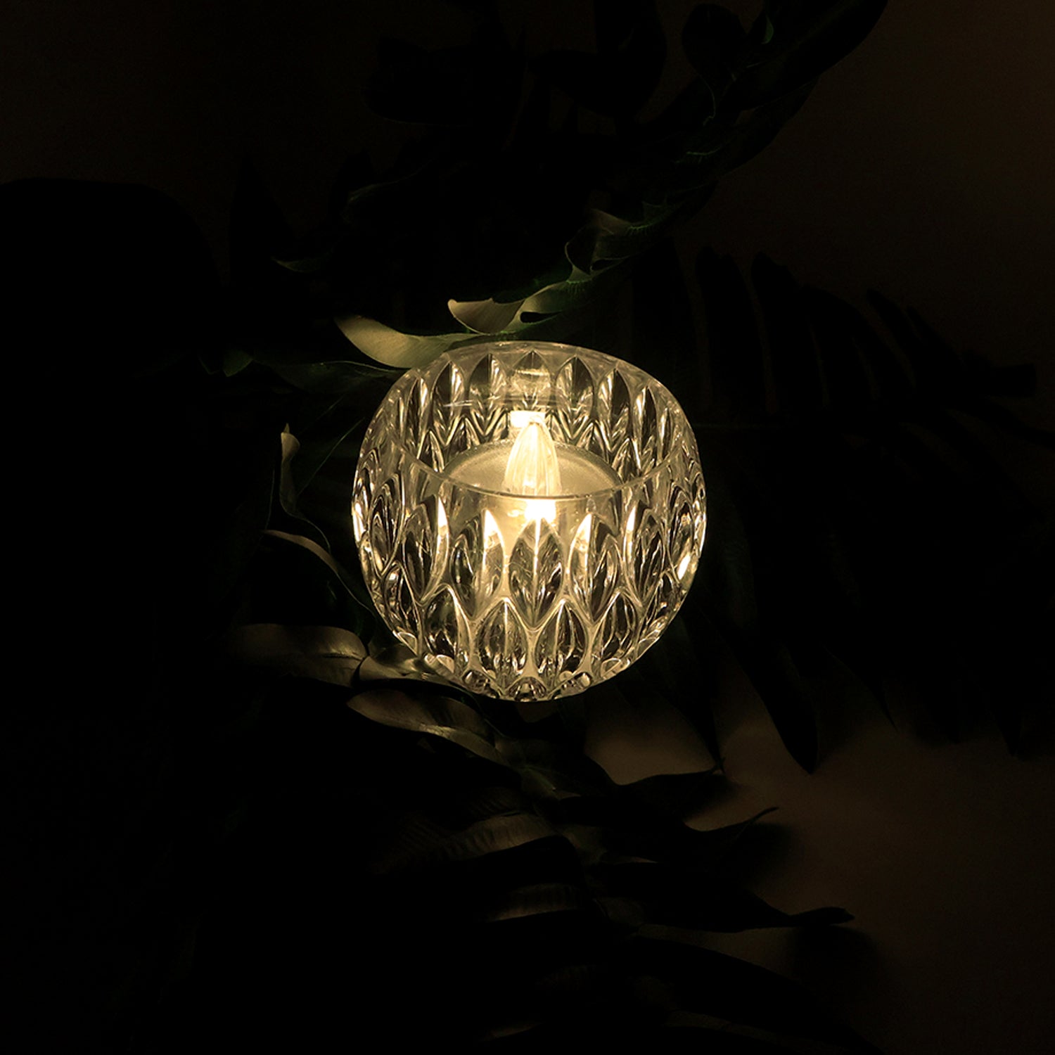 Set of 12 Wukusy crystal-style LED decorative lamps shaped like candles for home decor, with a glowing, elegant appearance.
