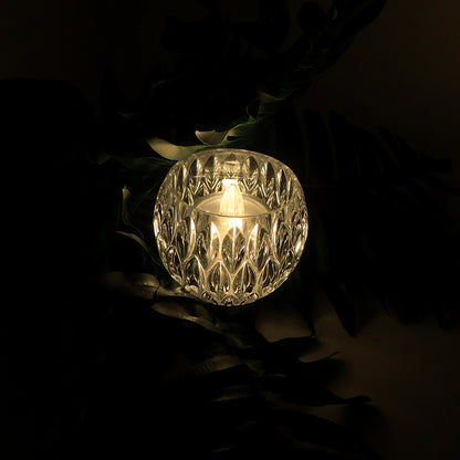 Set of 12 Wukusy crystal-style LED decorative lamps shaped like candles for home decor, with a glowing, elegant appearance.