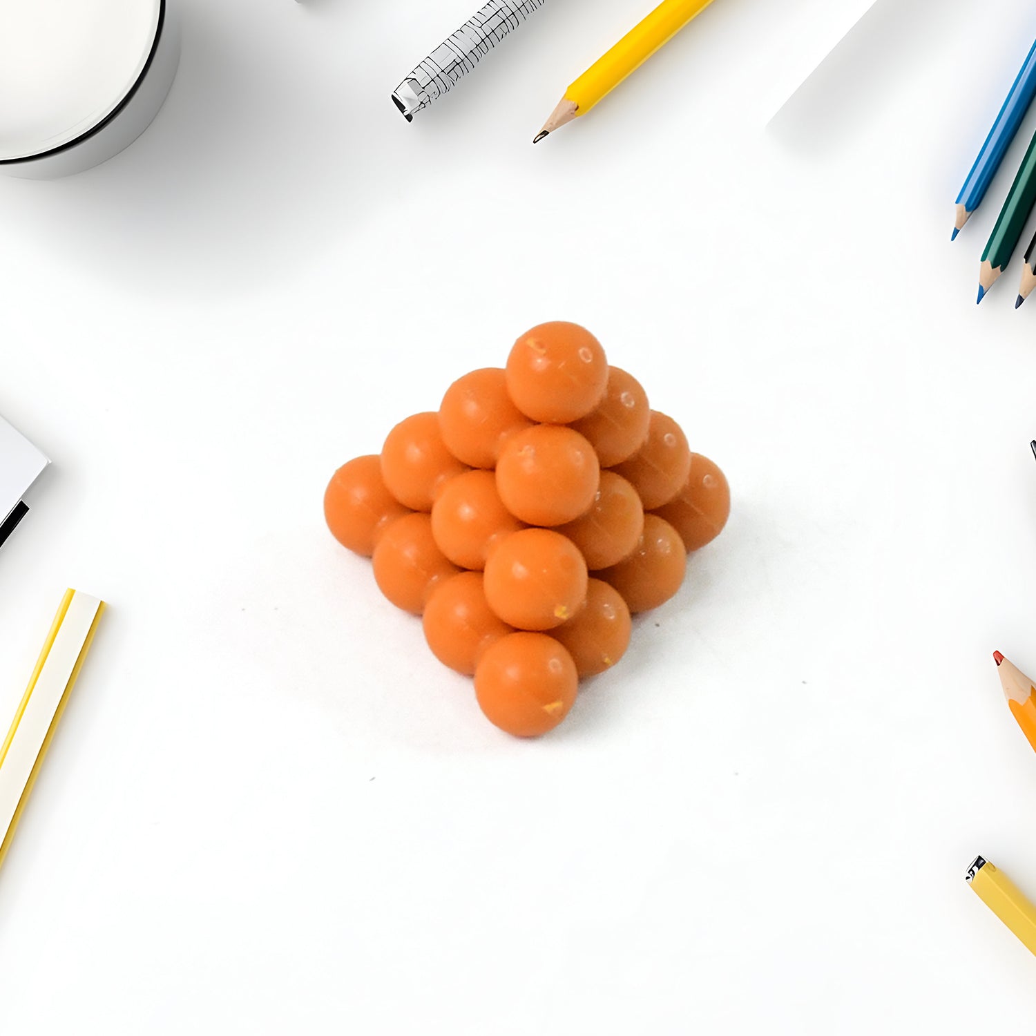 Wukusy 3D ball pyramid puzzle toy, a brain teaser and building toy with colorful interconnected spheres for challenging fun.