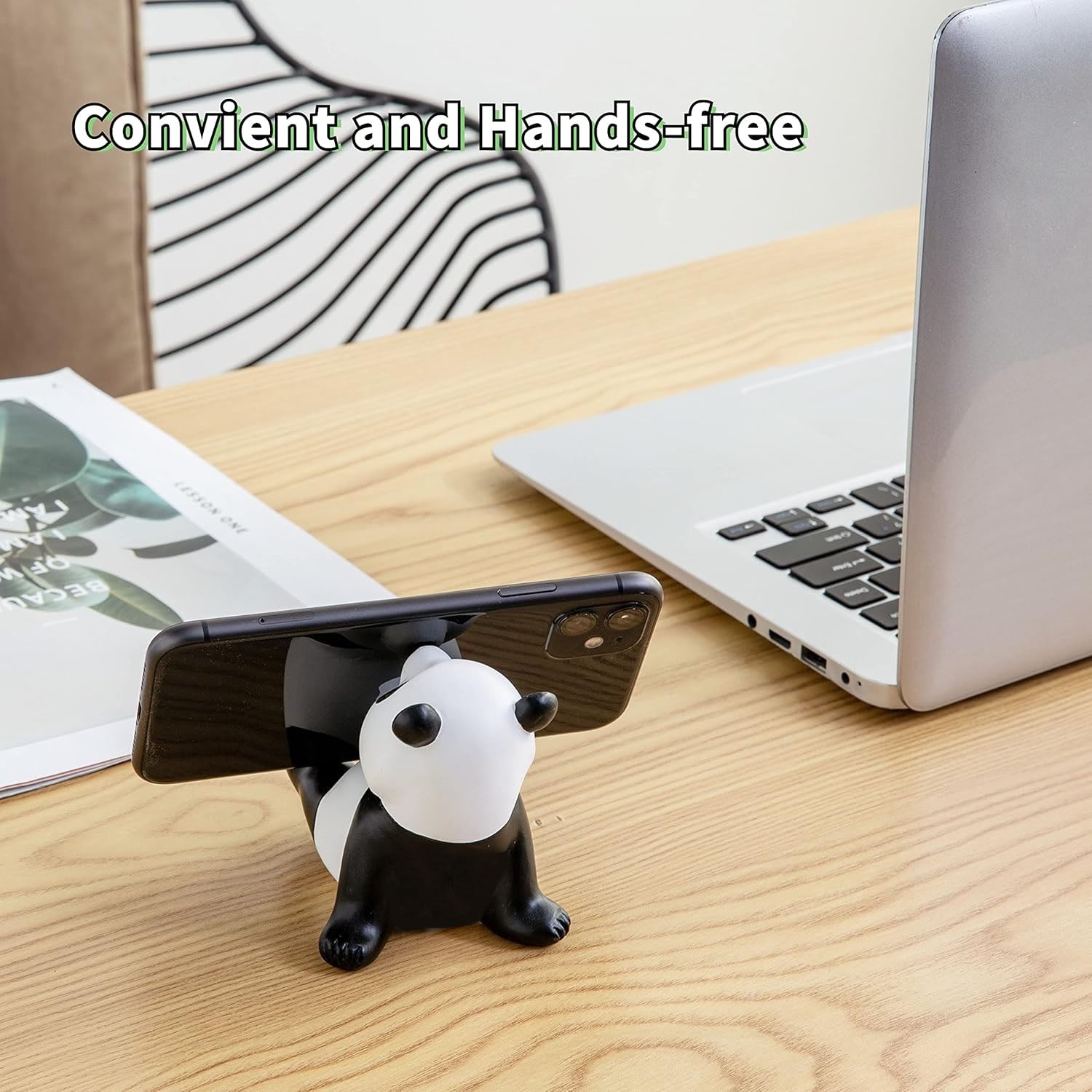 Wukusy cute panda mobile phone stand holder showing a panda-shaped phone stand on a flat surface.