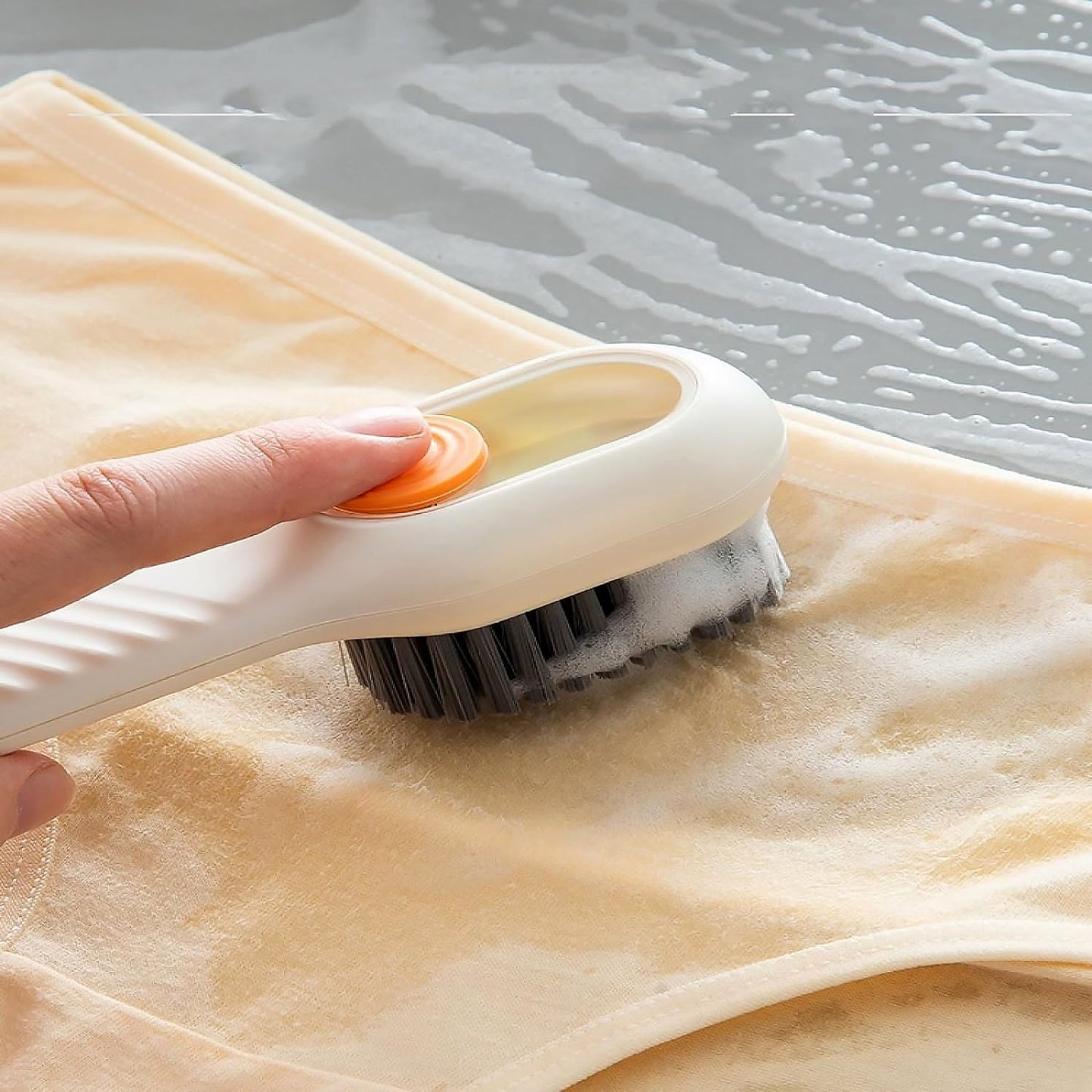 Wukusy multifunctional scrubbing brush with liquid soap dispenser, handle for cleaning shoes, clothes, and household surfaces.